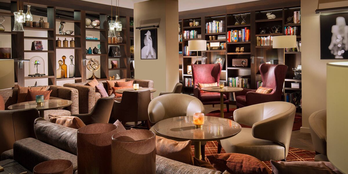 Cosy library in ACASA Suites with the feeling of a lounge